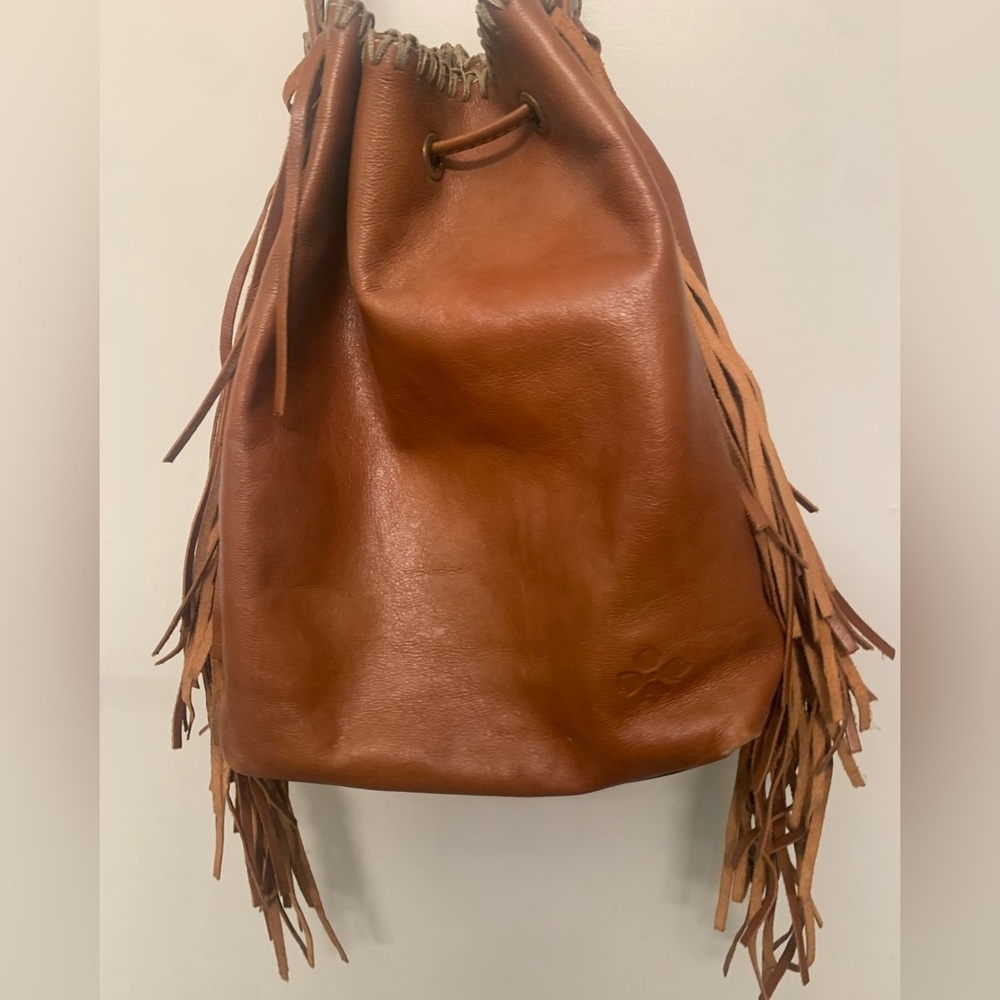 Patricia Nash tan leather tassel bucket bag